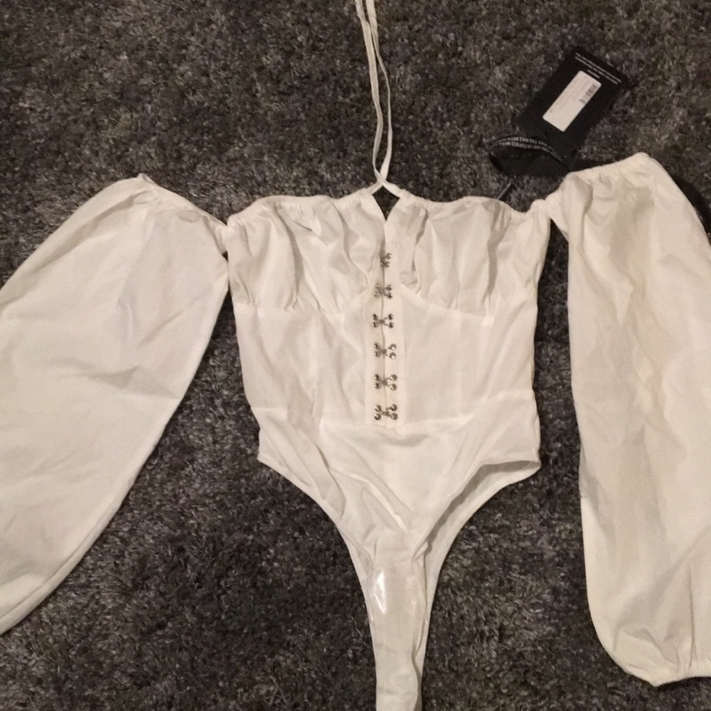 White bodysuit longsleeve. BRAND NEW, NEVER WORN